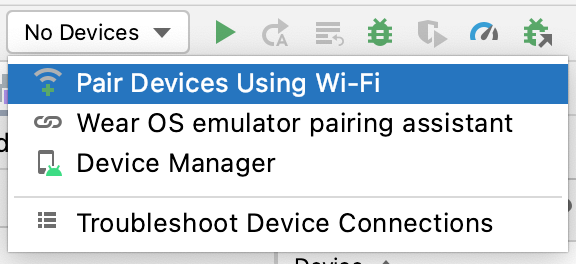 Gambar ini menampilkan menu drop-down dengan opsi Pair Devices Using Wi-Fi yang dipilih.