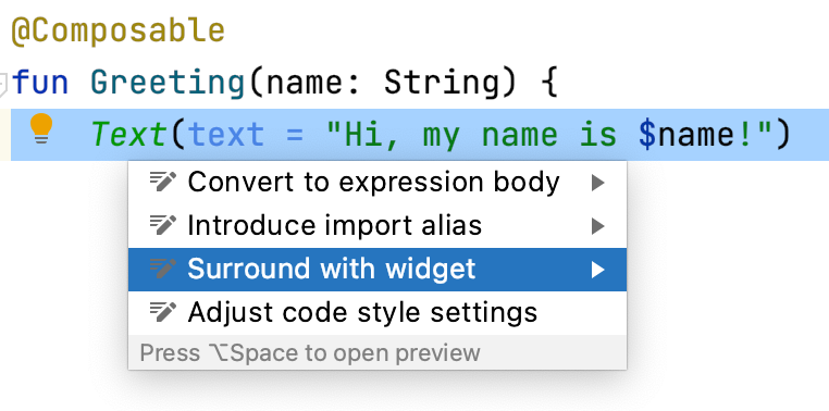 Text コンポーネントがハイライト表示され、その下に [Surround with widget] が選択されたメニューが表示されている画像。
