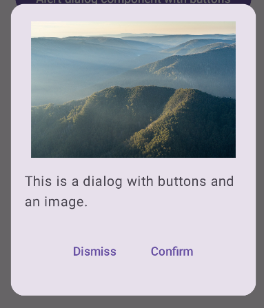 Un cuadro de diálogo con una foto del monte Feathertop, Victoria. Debajo de la imagen, hay un botón para descartar y un botón para confirmar.