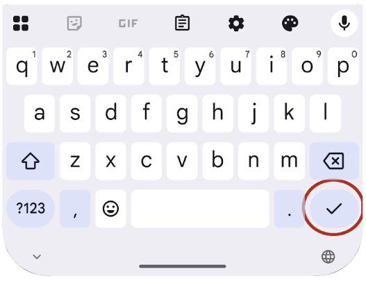 Un botón de acción del teclado en pantalla (un ícono de marca de verificación) rodeado en rojo.